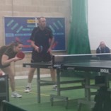 Emily Standing and Dave Reeves on their way to winning the Mixed Doubles title