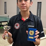 John Quintos with trophies